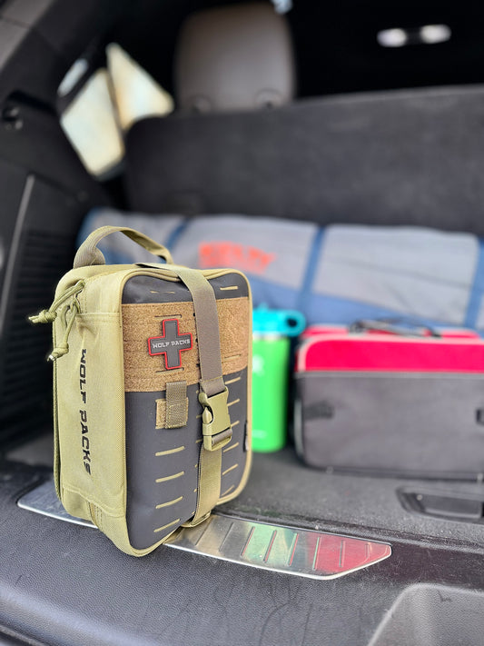 Alpha First Aid Kit stored in a vehicle for roadside and emergency preparedness
